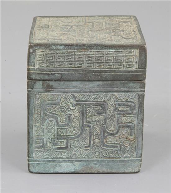 A Chinese archaic bronze square box and cover, Eastern Zhou dynasty, 6th-5th century B.C., 9.3cm high